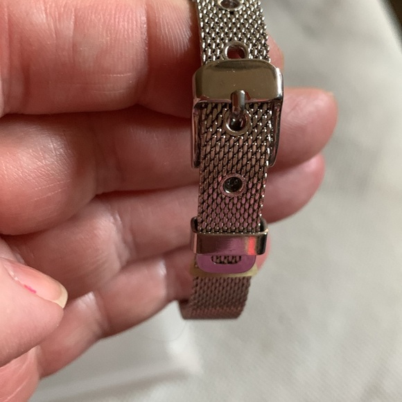 4 Bracelets Silver one can hold charms. Pinkish colored one from Holts. - Picture 6 of 6